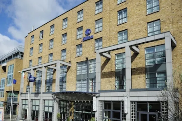 Liberty Global Plc's Billionaire Owner John Malone Buys Hilton And Trinity Hotels In Dublin