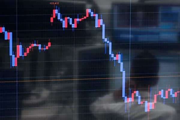 Dealers At Foreign Exchange Brokerage As Japanese Stocks Retreat On Higher Yen
