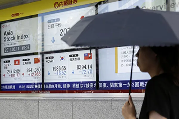 Stocks Boards And Chinese Yuan Banknotes AS China Devalues Yuan by Most in Two Decades