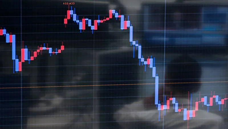 Dealers At Foreign Exchange Brokerage As Japanese Stocks Retreat On Higher Yen
