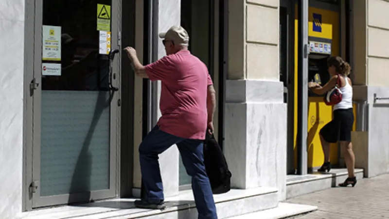 Greek Banks Reopen As Merkel Signals Debt Relief Option