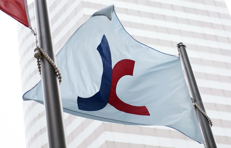 The flag of the Hong Kong Exchanges (Xaume Olleros/Bloomberg) 