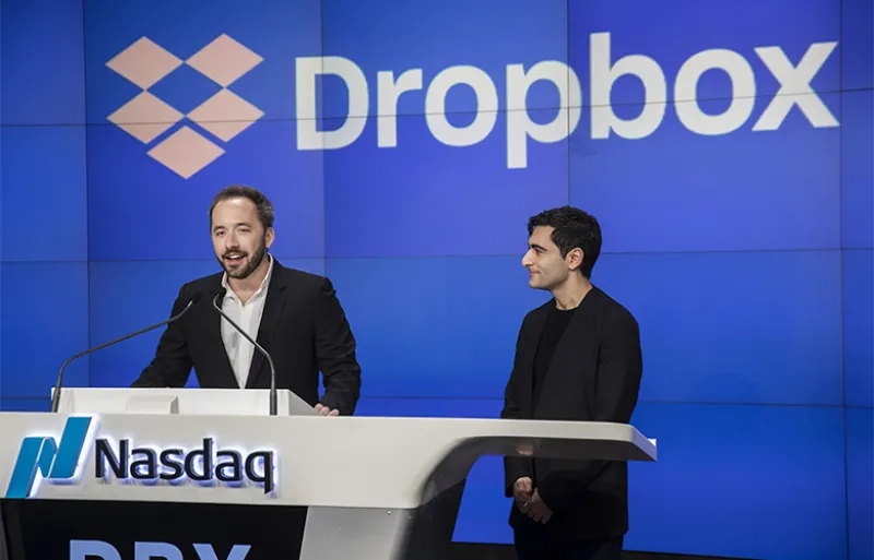 Drew Houston (left), CEO and co-founder of Dropbox, and Arash Ferdowsi, co-founder of Dropbox, during the company’s initial public offering on March 23, 2018 (Victor J. Blue/Bloomberg)